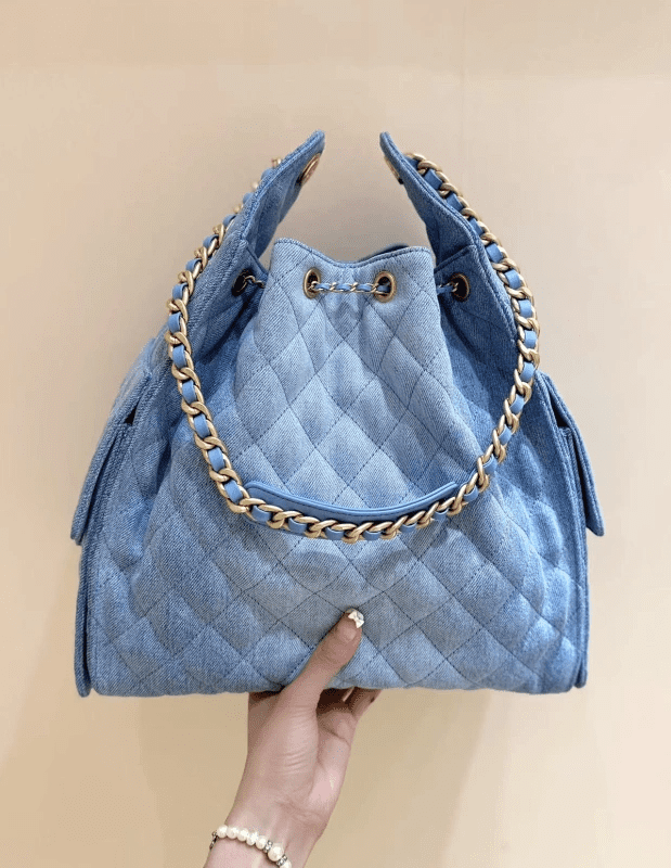 Ch**el 25 MEDIUM HANDBAG