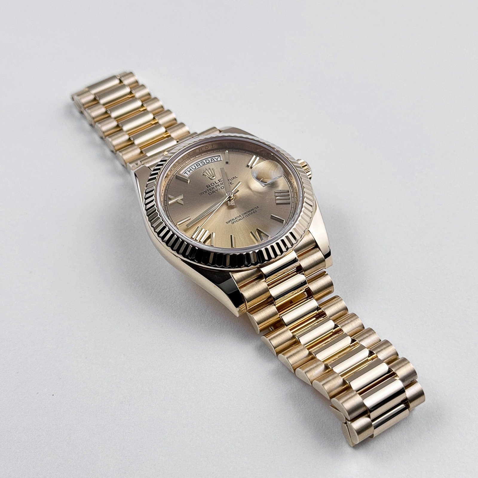 R01ex Day-Date 40 228238 Yellow Gold Champagne Roman Dial